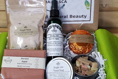 Beauty by Francesca Subscription Box with shower steamer, apple soap, bath salts, body oil and face mask,