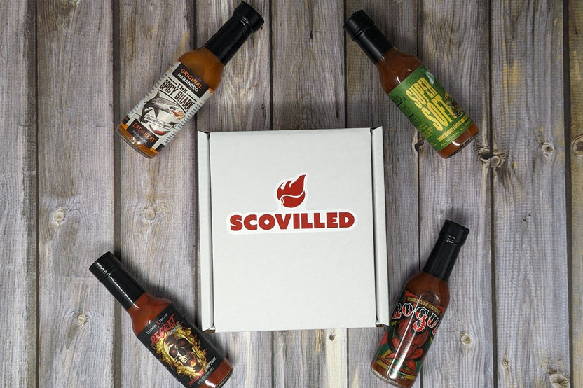 SCOVILLED hot sauce of the month featuring The Spicy Shark, Up All Night Bottling Co., Elijah's Xtreme, and High River