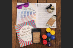 BOX CONTAINING OHM BOX ITEMS FOR THIS THEME: COLOR THERAPY                                                           
