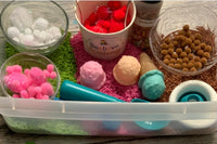 Ice Cream Sensory Kit with red, white, brown and pink pom poms. plastic ice cream scoops, ice cream cones and ice cream scoop. Colored rice