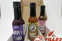 SCOVILLED hot sauce of the month featuring FAIYA Purple Flame, Karma Sauce Huhu PIna, Fat Cat Strawberry Serrano