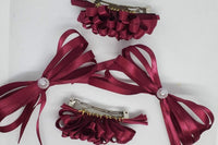 A burgundy 4 pack perfect for any fall occasion. Satin ribbon gives a slight sheen that draws the eye. Our ruffle now is always eye catching