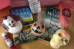 Bubbles & Books subscription box featuring a romantic novel, handmade soap, and bath products for relaxation