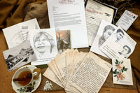 Vintage letters and hand draw sketches, postcards, vintage christmas cards, photocopied documents and a cup of tea