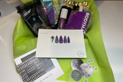 Example Box: Celestial Vibez. Packaged in signature neon green tissue paper. Comes with nail set, stickers, jewelry, beauty items, etc.