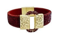 A red and gold Oliver Christopher's Boutique Box bracelet, a perfect gift.
