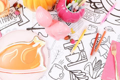 Seasonal kids coloring tablecloths; fun, themed designs delivered monthly for creative playtime all year long. Made in the USA