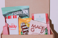 A Shark Week Survival Kit period subscription box featuring essential supplies for a comfortable and confident experience. 