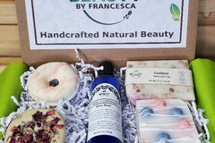 Beauty by Francesca Subscription Box with body conditioner, bath bomb, bath cookie, confetti soap and berry soap.