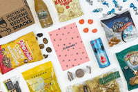 The El Dorado box which contains dried mushroom snacks, chips with Roquefort cheese and a special pear juice with Sichuan peppers