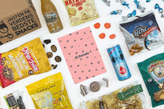 The El Dorado box which contains dried mushroom snacks, chips with Roquefort cheese and a special pear juice with Sichuan peppers