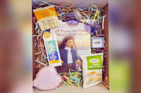 Summer Box 2023 (Chapter Book Age Group) - Included the monthly book, summer-themed bookmarks, Squishmallow bathbombs, sunglasses, and more.