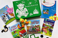A green, Lil Readers Book Club subscription box with several kids books, a duck toy and chicken, pig and cow cutouts.
