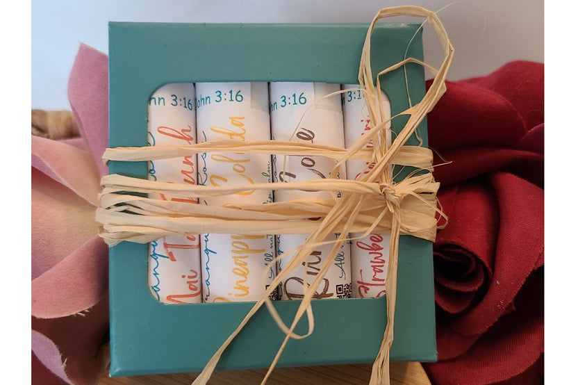All-Natural lip balm set of four happy hour themed flavors.                                         