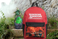 A Dungeons and Dragons Laptop Backpack and a Dragon LED Crystal Light. The backpack has the Dungeons and Dragons logo and a handbook cover.