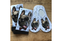 A Dapper French Bulldog with a bow tie, against a white background and allover French Bulldog print.