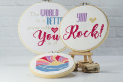 3 modern cross stitch design you create DIY with positive words and groovy style sun and waves with thread, fabric, embroidery hoops