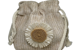 Crossbody straw pull string bag with  flower for girls.  Interior lined with waterproof lining.  Perfect for a cell phone, ID and house keys