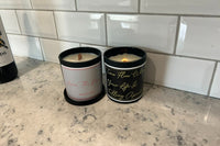 An example of our (2) scented candle subscription box featuring De-motivational/dark humor quotes. Fragrances and quotes will vary.