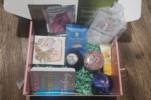 A box filled with reminders that you are enough and loved! The box is filled with lots of goodies. There is lotion, face mask and so much mo