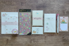 Packs by Misty Co. stationery subscription bundles with stickers, sticky memo, message cards, writing paper, letter set, washi tape and pen.