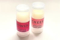 Examples of the goodies we enclose with each kit include wool wash, lip balm, candles, and stitch markers - The Spinning Hand