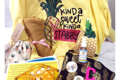 Yellow tshirt with pineapple that says Kinda Sweet, Kinda Stabby, yellow sunglasses, personalized pineapple bag, earrings, room spray,