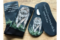 Wolf Crew Socks, and No-Show Socks with the quote "A wolf doesn't concern himself with the opinions of sheep."