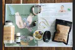 BOX CONTAINING OHM BOX ITEMS FOR THIS THEME: AROMATHERAPY                                                           