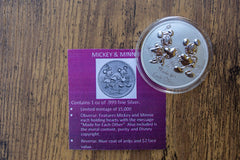 Minnie and Mickey Mouse 1 oz .999 Silver limited edition (15,000) collector's coin is an example of the Disney themed boxes