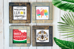 Brown and gray wood framed signs in various designs. Summer popsicles, sweet summer watermelon, bee happy.