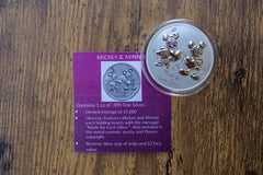 Minnie and Mickey Mouse 1 oz .999 Silver limited edition (15,000) collector's coin is an example of the Disney themed boxes