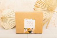anchor of hope box subscription box with branded flower sticker a monthly ethical subscription box full of artisan made goods