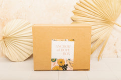 anchor of hope box subscription box with branded flower sticker a monthly ethical subscription box full of artisan made goods
