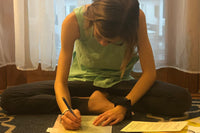 Dancer using her Ballet Kit for Teens & Tweens. Worksheets, coloring pages, ballet history, charms for dance bag and more!