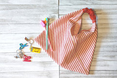 Pictured here is a popular past box project. This project is a bento bag made by folding and sewing one rectangular piece of fabric. 