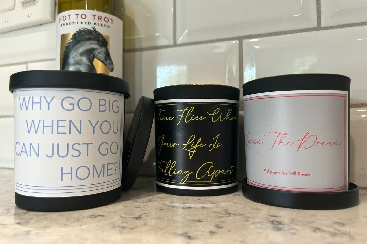 An example of our (3) scented candle subscription box featuring De-motivational/dark humor quotes. Fragrances and quotes will vary.