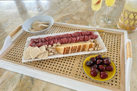 Truffle pairings Tapas box Spread tray including Cured meat fuet, Aged mixed milk cheese, Truffle pistachios and crackers.