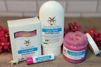 Love Spell February special scent bottle of goat milk lotion, bar of soap, sugar scrub, and a Watermelon Lip Butter.