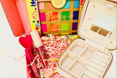 We offer items like travel size jewelry box lipstick eyeshadow palettes. We also offer gift wrap upon request.