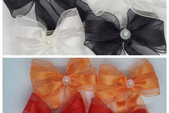 All Hair Bows use a range of ribbon textures giving each set of bows a more structured or whimsical appeal. Satin organza blend pictured 