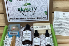 Beauty by Francesca Subscription Box with facial wash, facial serum, facial oil and bamboo facial brush.