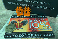 Dungeon Crate™ subscription box featuring exclusive member card, flame miniatures, and a treasure token for roleplaying games