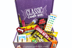 A Classic Candy subscription box filled with candy like Black Cow, Oh Henry, Goodbar, Pop Rocks and many more.