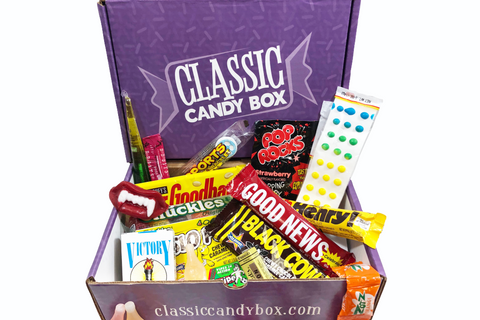 A Classic Candy subscription box filled with candy like Black Cow, Oh Henry, Goodbar, Pop Rocks and many more.