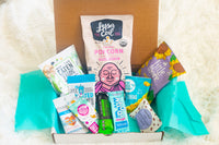 healthy snack box with lesser evil, off the eaten path, whoa cookie dough, zee zees, the good bean, junkless bar