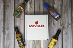 SCOVILLED hot sauce of the month featuring Mikey V's, Stanky Sauce, High Desert Sauce Co., and Up All Night Bottling Co