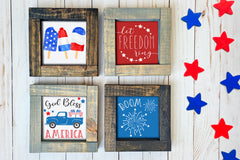 Brown and gray wood framed signs in various designs. 4th of July Independence day red white blue signs. Let freedom ring, god bless america.