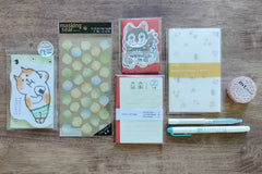 Packs by Misty Co. stationery subscription bundles with memo pad. sticker sheet, letter paper, message cards, writing paper, pens and tape.