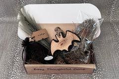 Entry Envy November Refill Decor Kit- pictured: greenery floral pick with twigs, tea light, bat decoration, moss bag with securing picks. 